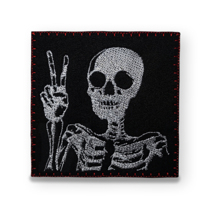 skeleton patch V gesture white background