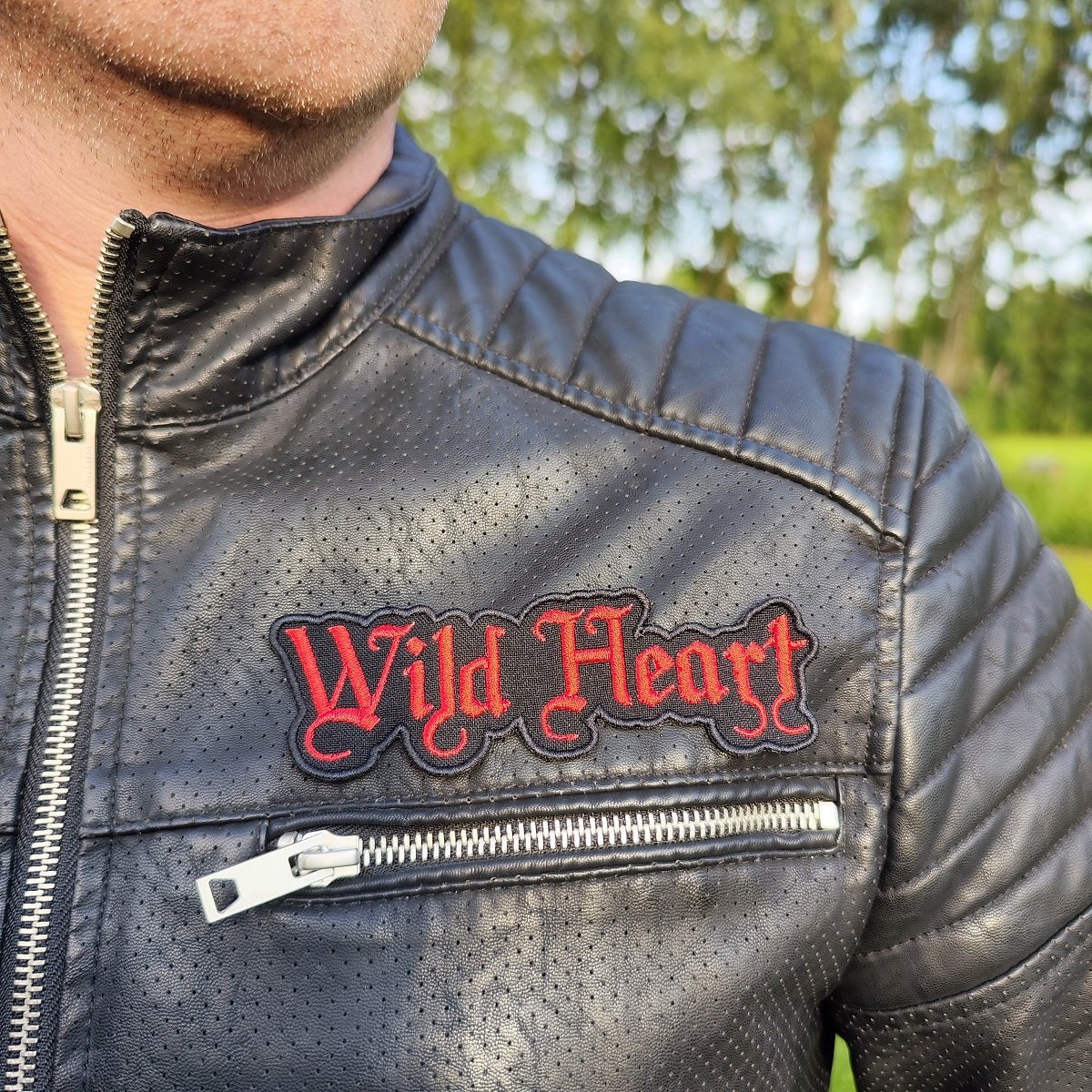 custom gothic text patch, men in a jacket with gothic patch