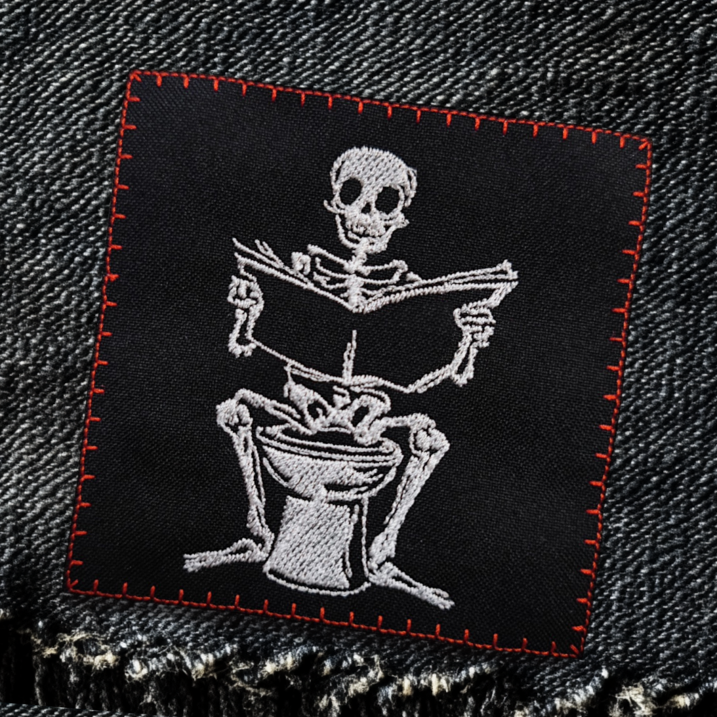 skeleton in bathroom patch on jeans